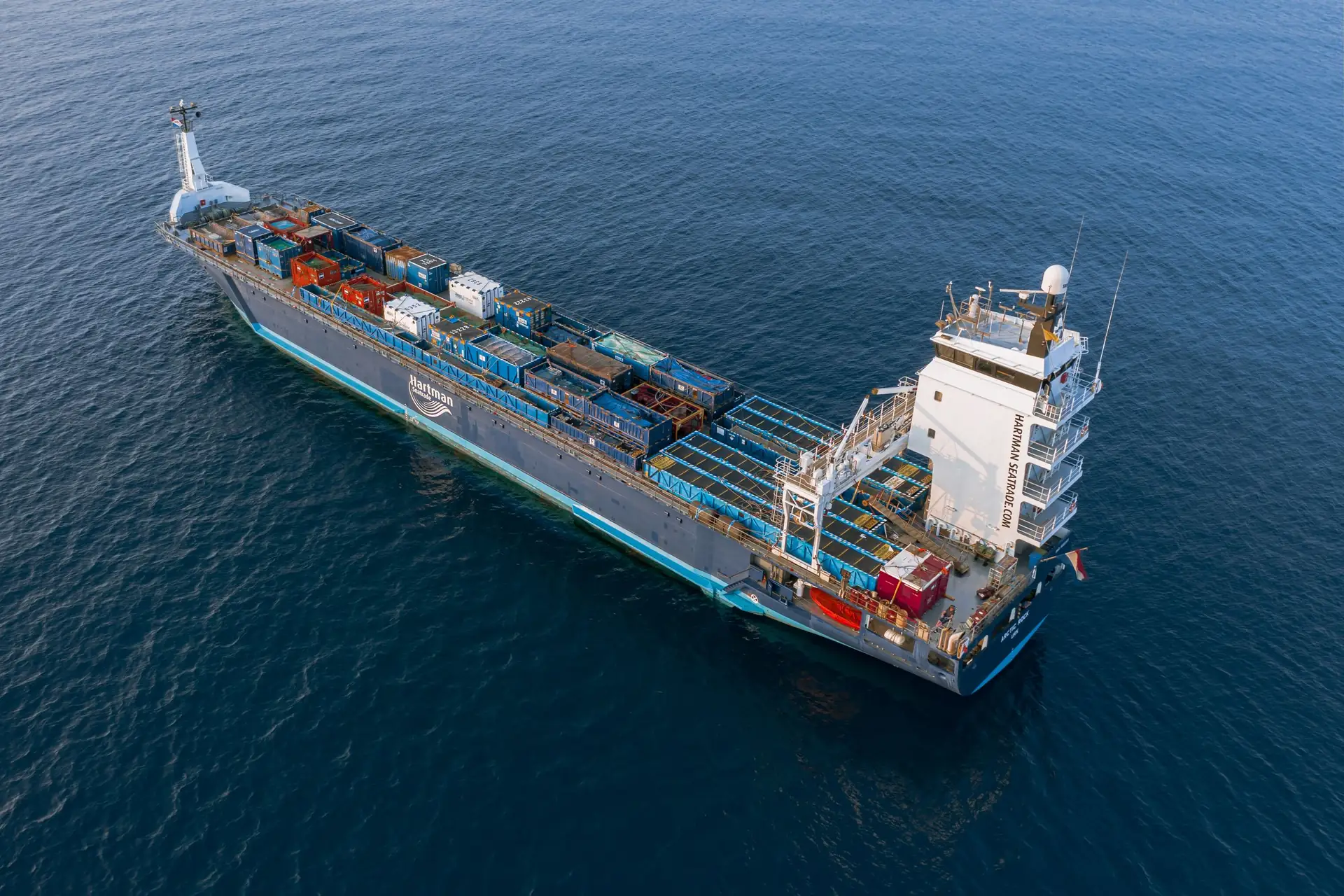 Container ship at sea, in illustrative foreign trade photography